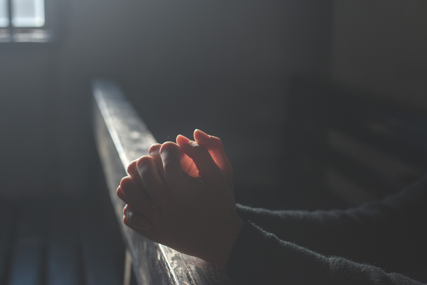 Hands held in prayer