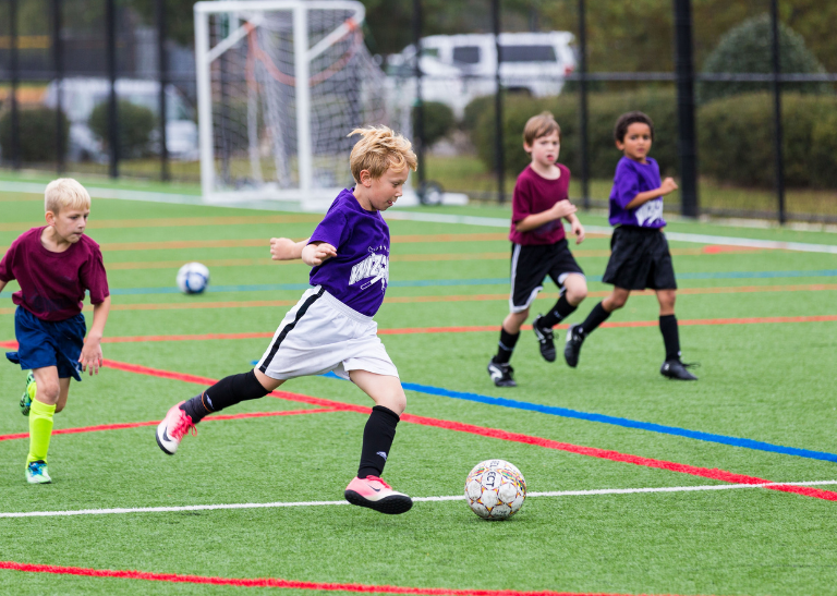 Pupils playing soccer